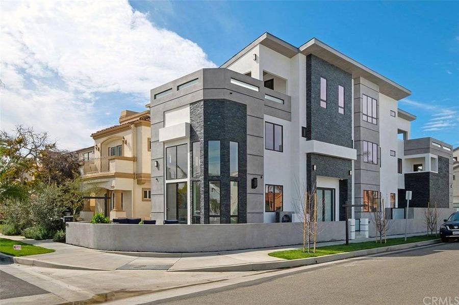 3-story house with roof deck, corner view